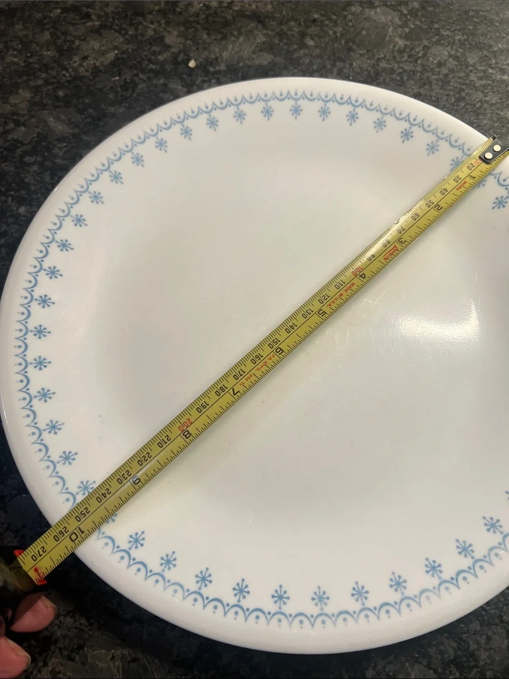 4 piece set of Corelle Dinner plates and salad plates. Snowflake Blue